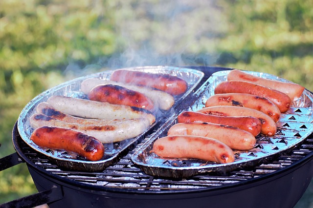 hot dogs on a portable grill